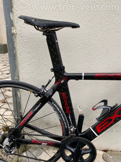 EXS CLM tri - 7