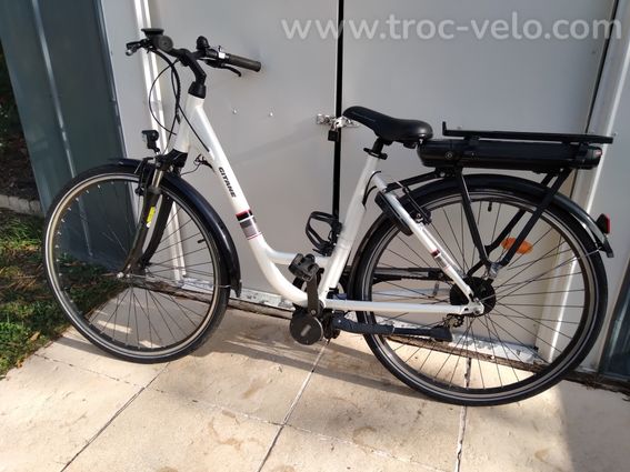 VTC électrique blanc femme taille S