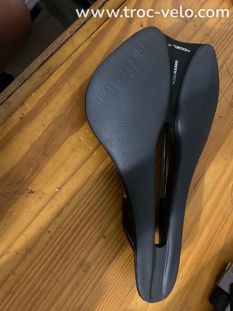 Selle modèl x - 1