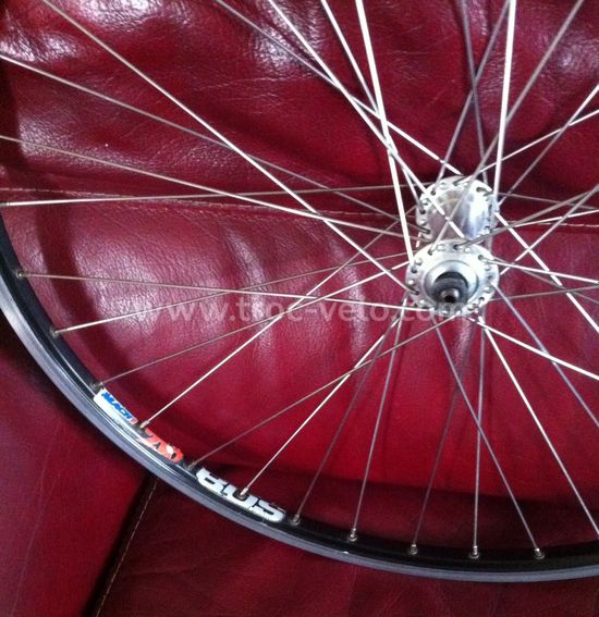 Roue vtt 26 av blocage jante argent mach1 er10 moy.Shimano tx500 v-brake