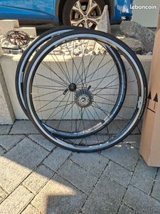 Paire roues route Shimano avec cassette WH-RS100 7... - 1